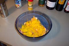 Rinse the chicken, pat dry, place in large bowl and cover with curry powder